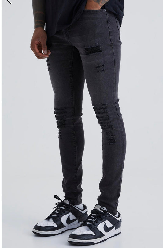 MAN - Super Skinny Jeans With ALL Over Rips