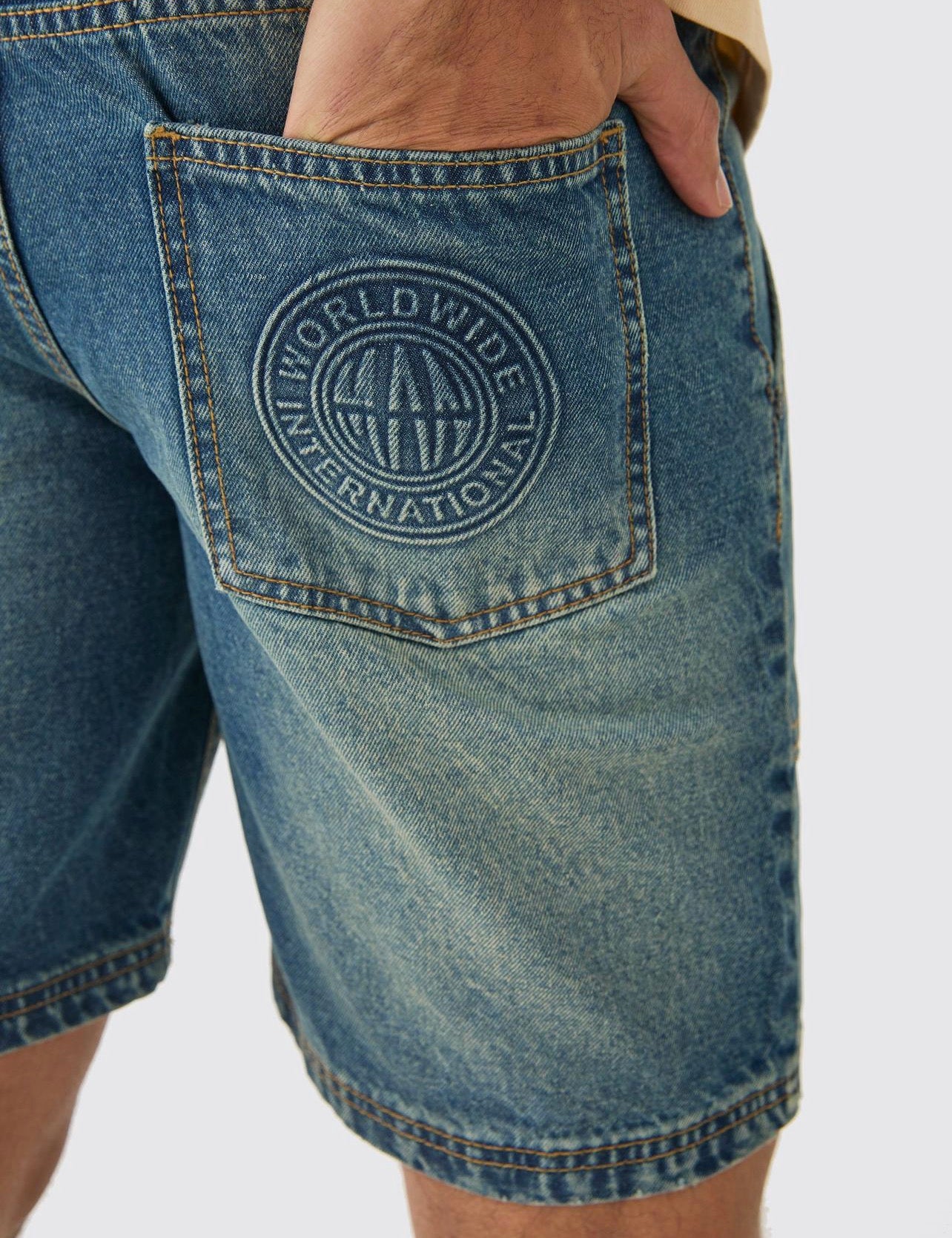 Man - Slim Rigid Embossed Denim Shorts